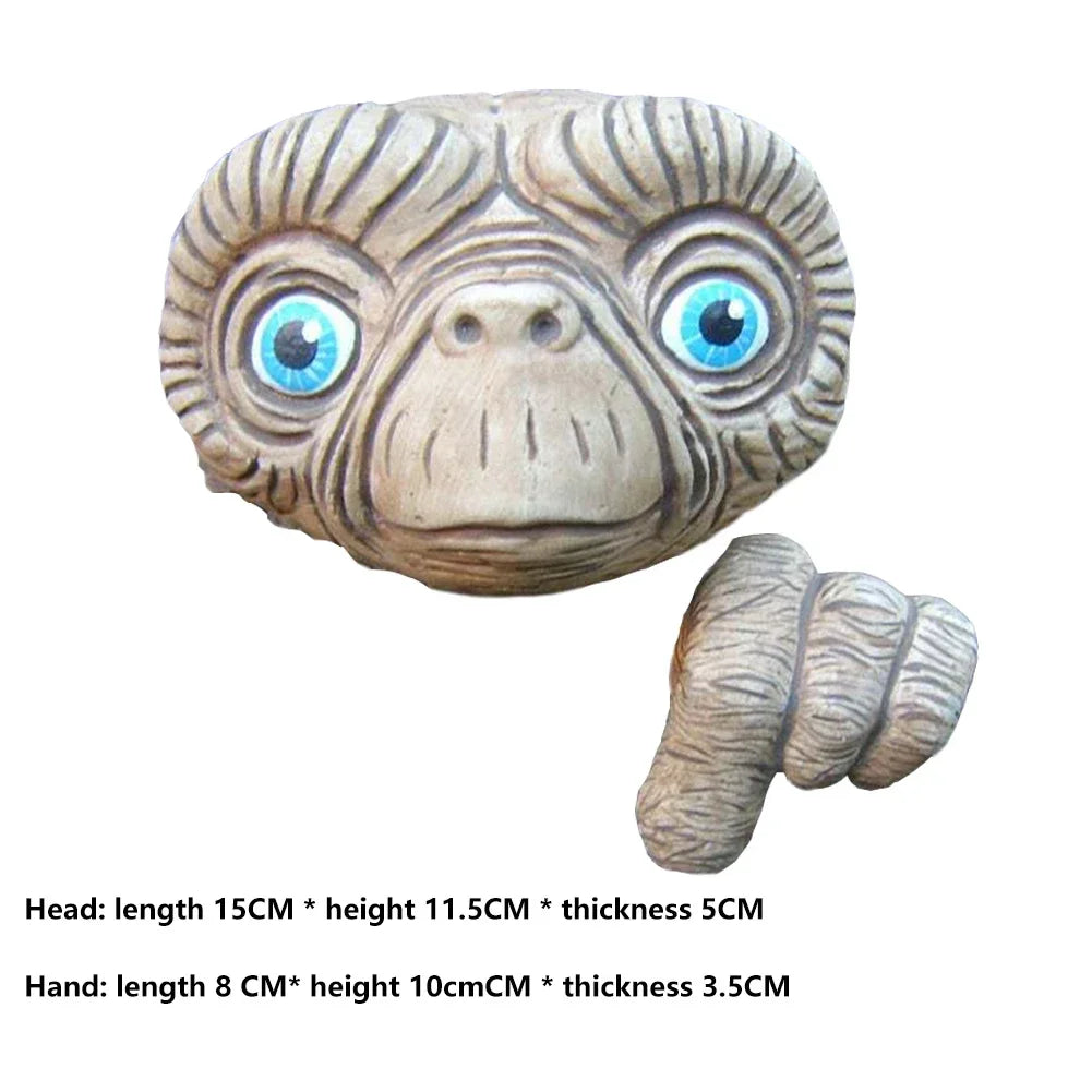 E.T. face and hand statue