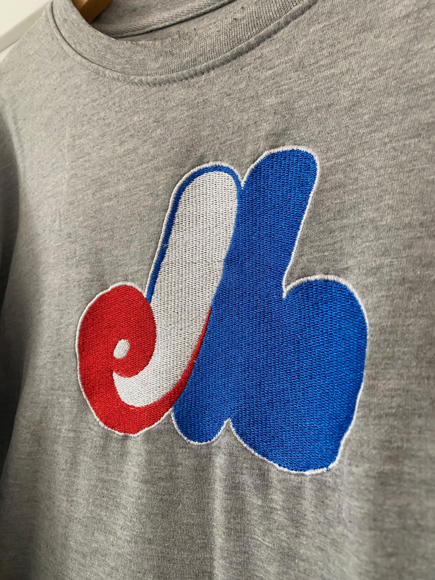 Grey long sleeve Montreal Expos jersey with front pockets