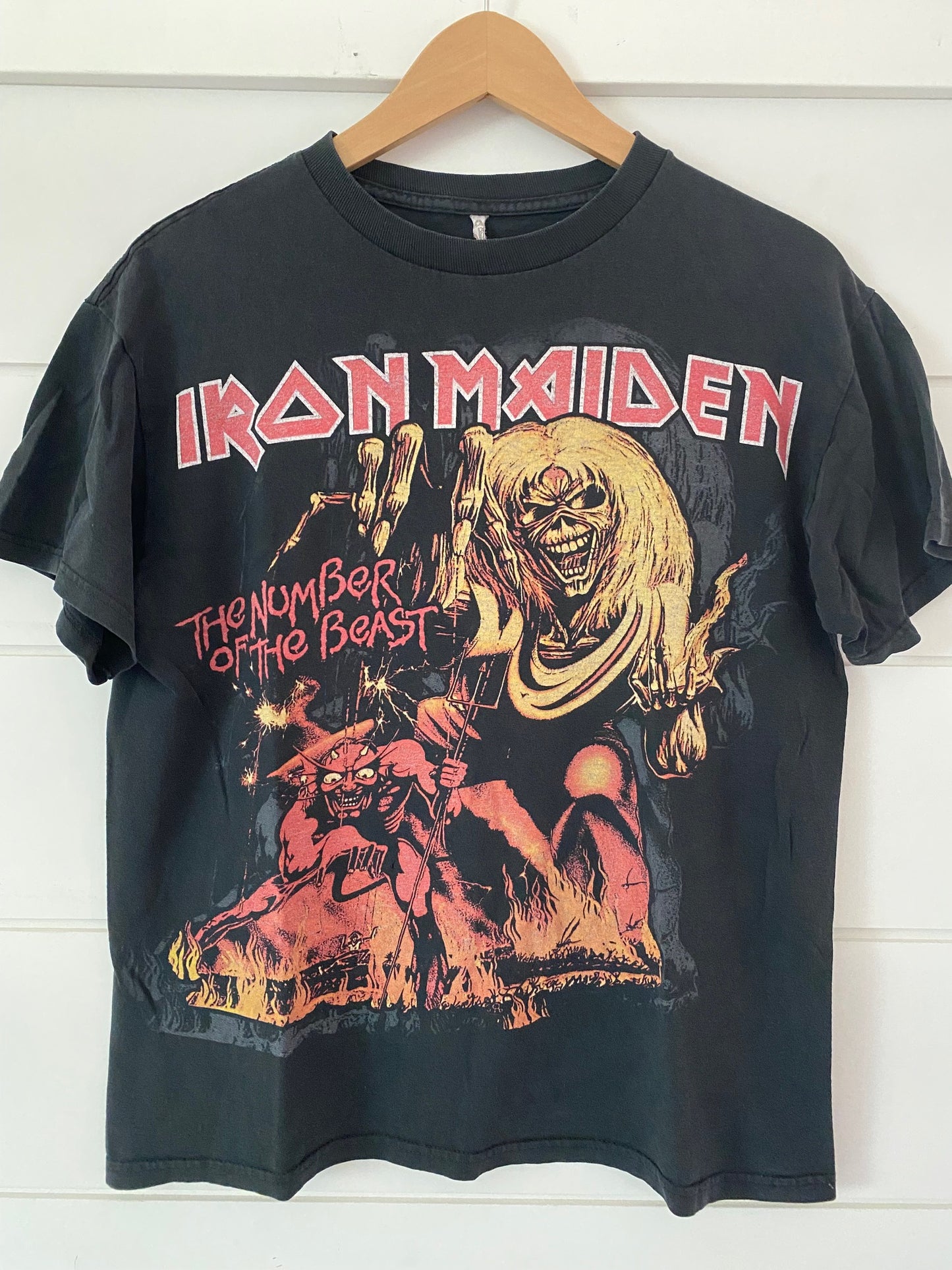 front of black short sleeve t-shirt iron maiden skull the number of the beast with devil