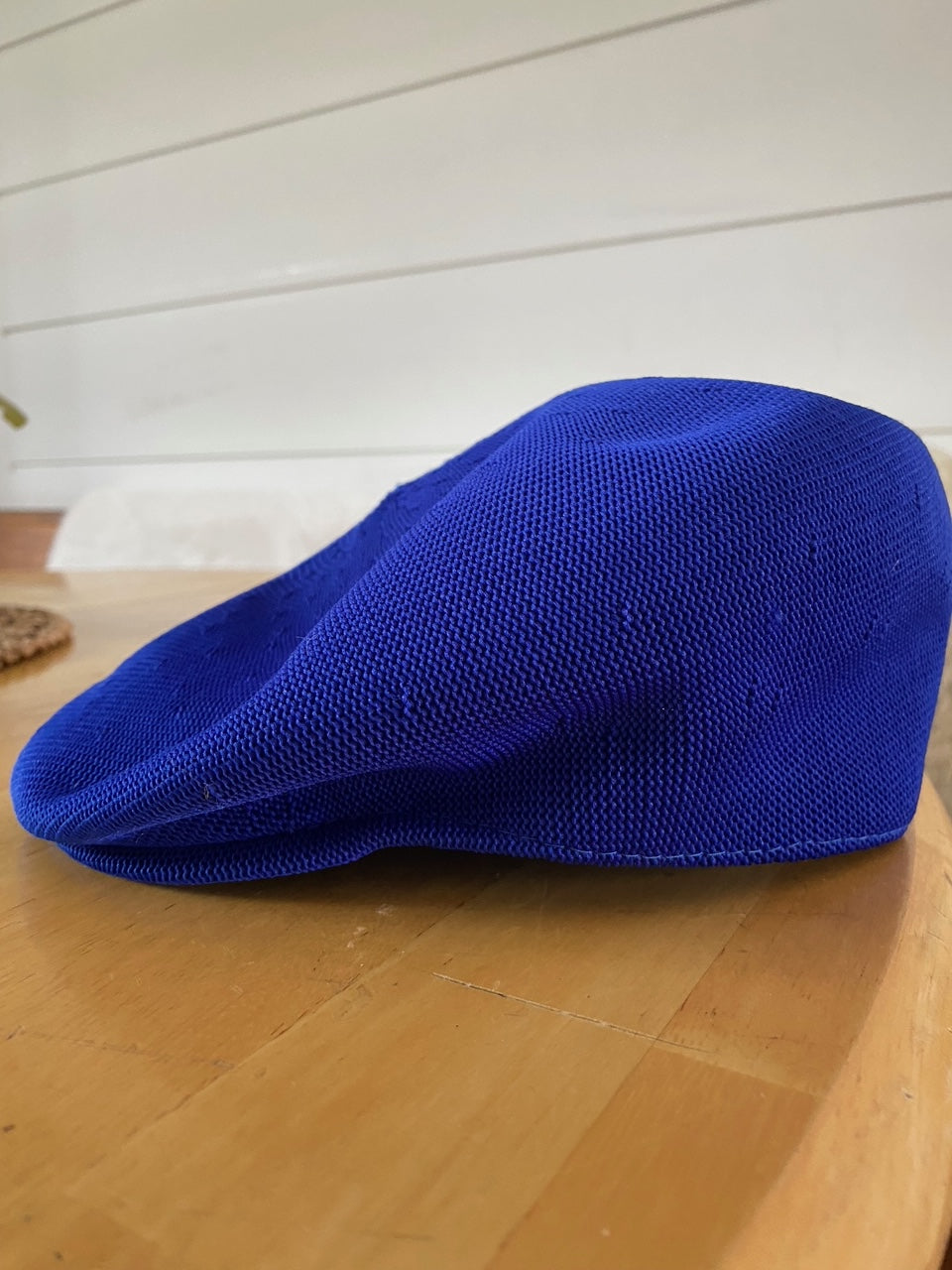 side of kangol blue hat