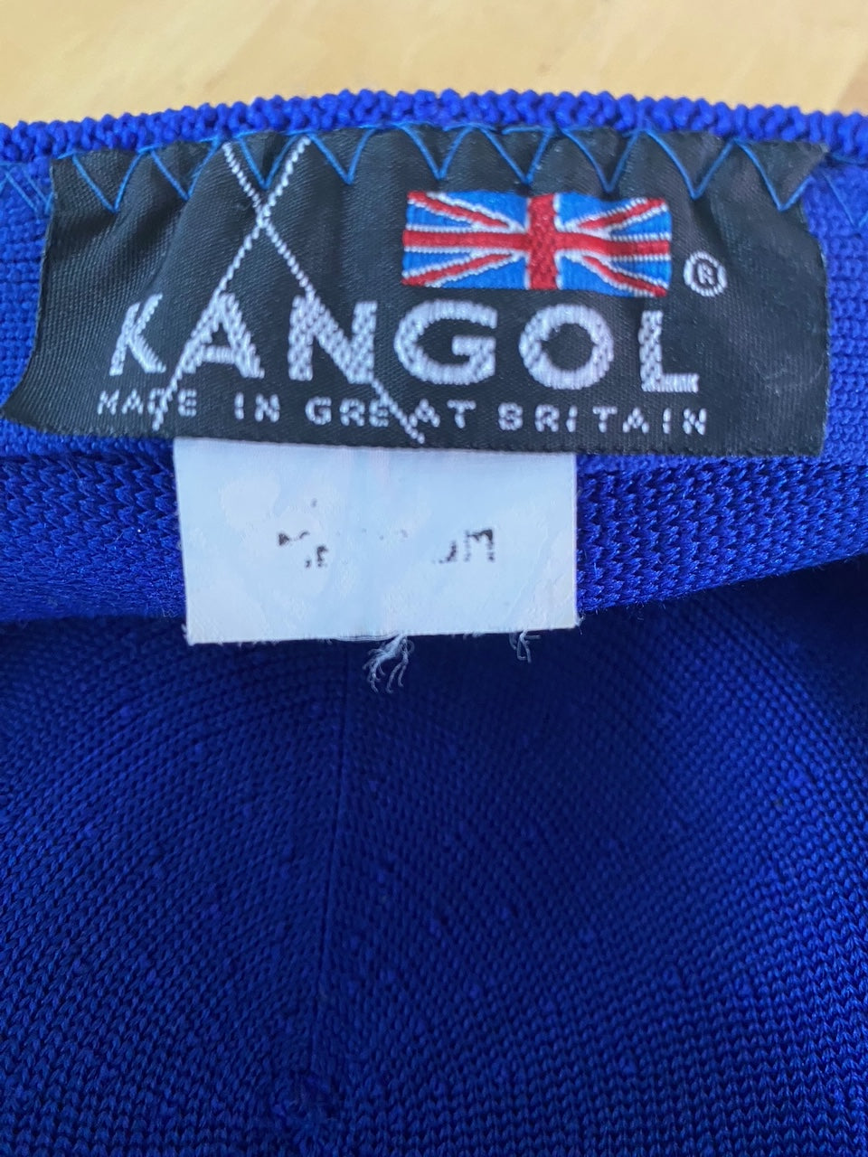 inside tag made in great britain kangol blue hat