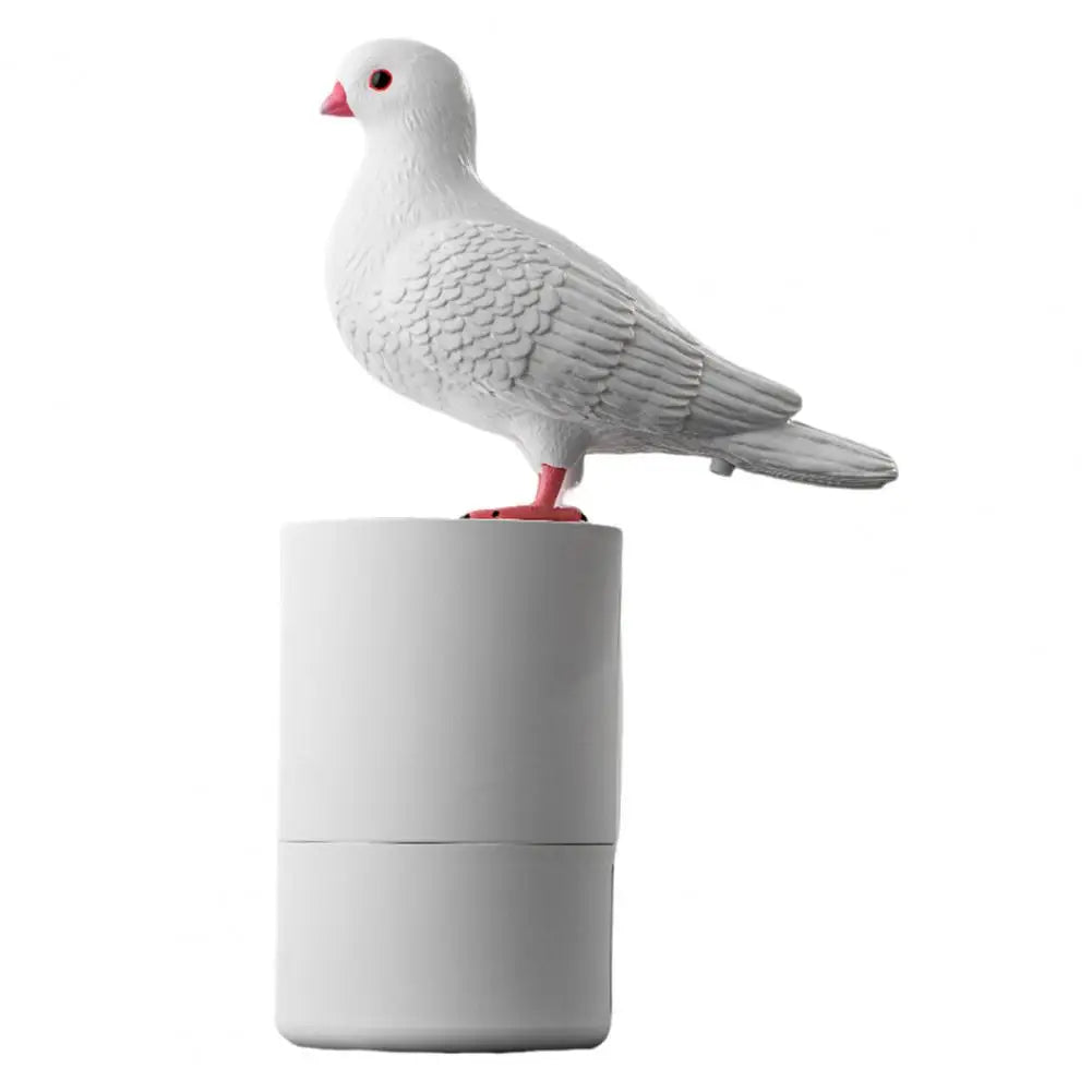 white pigeon on a round white bottle