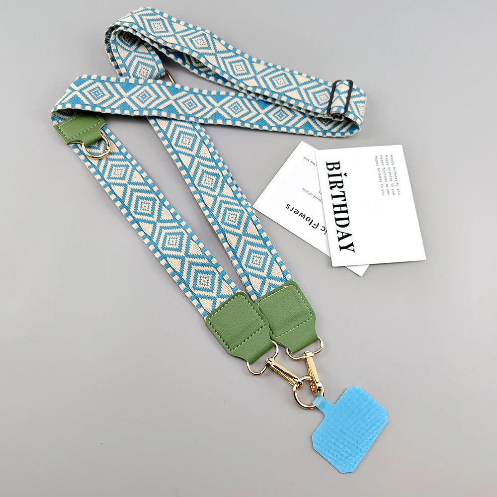 blue and green strap to hold a cell phone