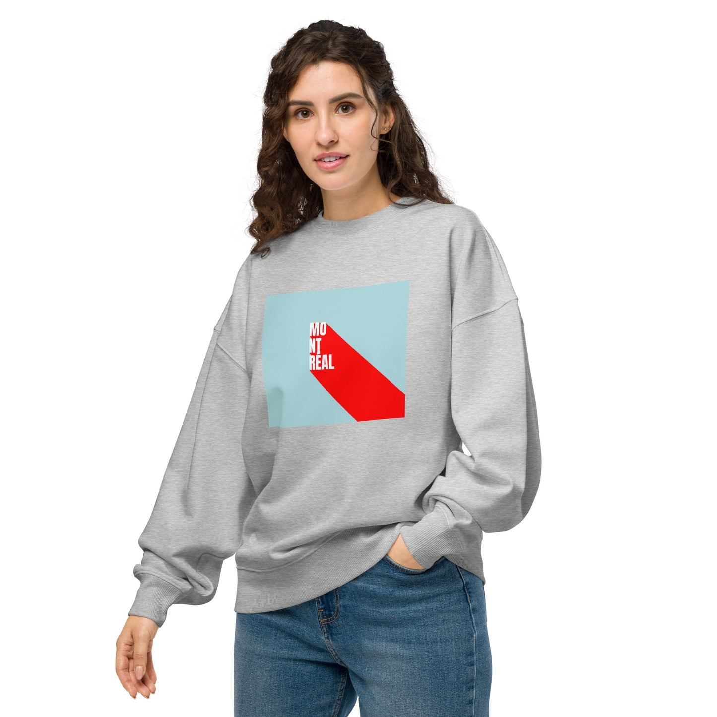 Product mockup of a women wearing a grey crewneck with montreal inscription